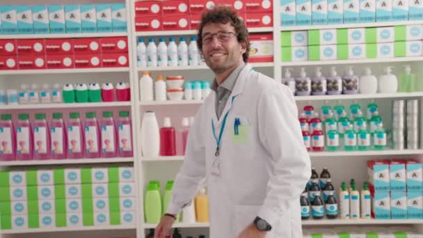 Young Hispanic Man Pharmacist Smiling Confident Standing Arms Crossed Gesture — Video