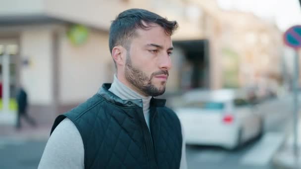 Young Hispanic Man Serious Expression Standing Street — Stok video