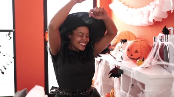 African American Woman Wearing Witch Costume Having Halloween Party Dancing — Video Stock