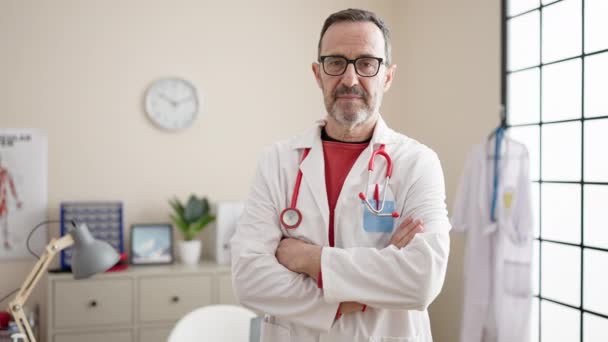 Middle Age Man Doctor Smiling Confident Standing Arms Crossed Gesture — Vídeo de Stock