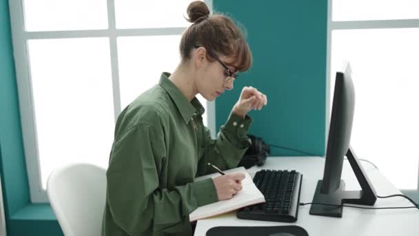 Young Caucasian Woman Student Using Computer Taking Notes Library University — Vídeos de Stock