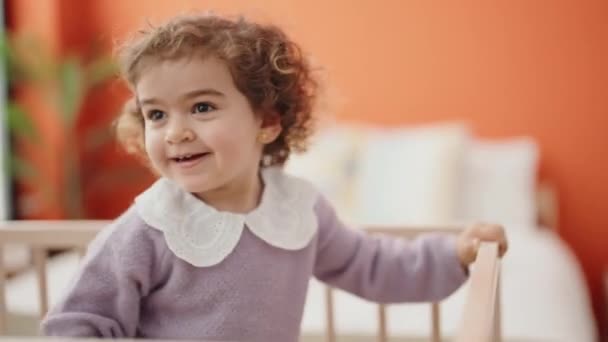 Adorable Hispanic Girl Smiling Confident Standing Cradle Bedroom — Video