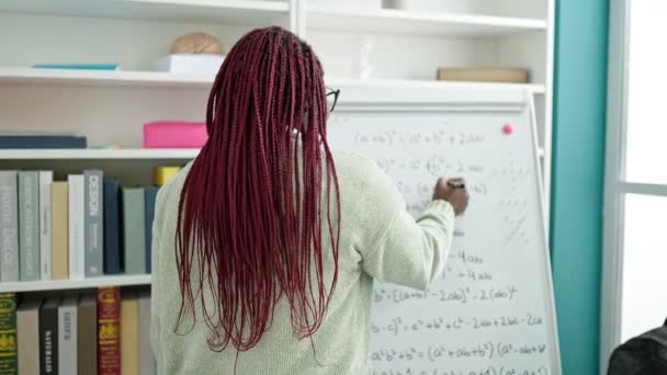 African Woman Braided Hair Standing White Board Smiling University Library — Stock Video