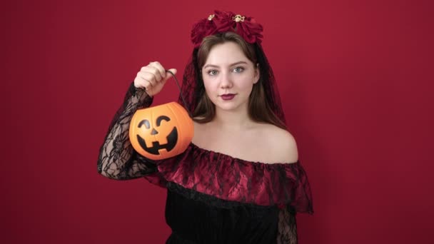 Young Blonde Woman Wearing Katrina Costume Holding Halloween Pumpkin Basket — Vídeo de Stock