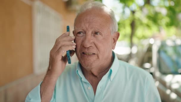 Senior Grey Haired Man Smiling Confident Talking Smartphone Street — Stok video