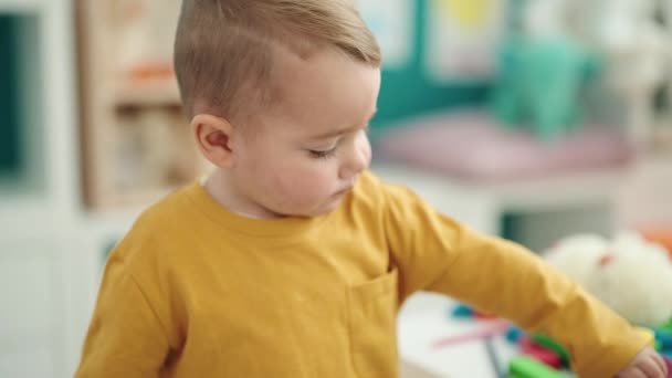 Adorable Blond Toddler Standing Relaxed Expression Kindergarten — Wideo stockowe