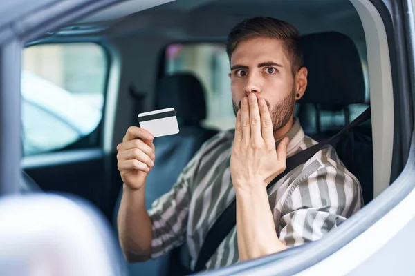 Hispanic Man Beard Driving Car Holding Credit Card Covering Mouth — Stock Photo, Image