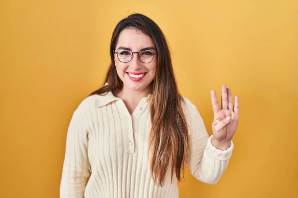 Young Hispanic Woman Standing Yellow Background Showing Pointing Fingers Number — Stockfoto