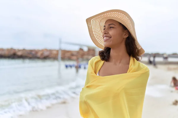 stock image Young african american woman smiling confident wearing summer hat and bikini at beach