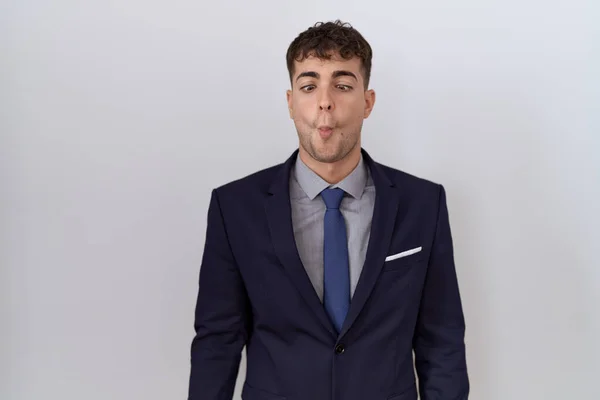 Young Hispanic Business Man Wearing Suit Tie Making Fish Face — Stock Photo, Image