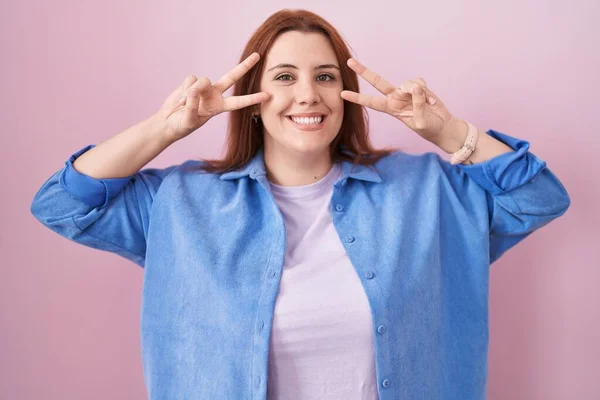 Young Hispanic Woman Red Hair Standing Pink Background Doing Peace — Stock Photo, Image