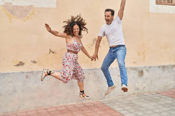 Man Woman Couple Smiling Confident Jumping Street — Stock Photo, Image