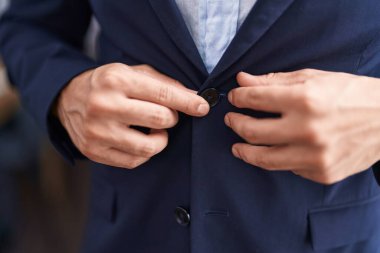 Young arab man business worker wearing jacket at street