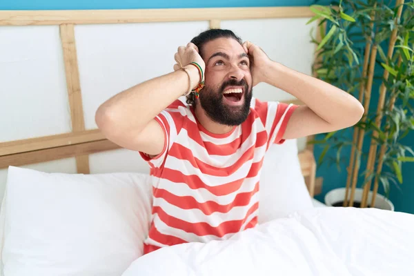 Young Hispanic Man Sitting Bed Surprise Expression Bedroom — Fotografia de Stock