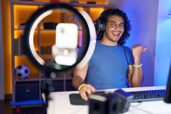 Hispanic Man Curly Hair Playing Video Games Recording Smartphone Pointing — Stock Photo, Image