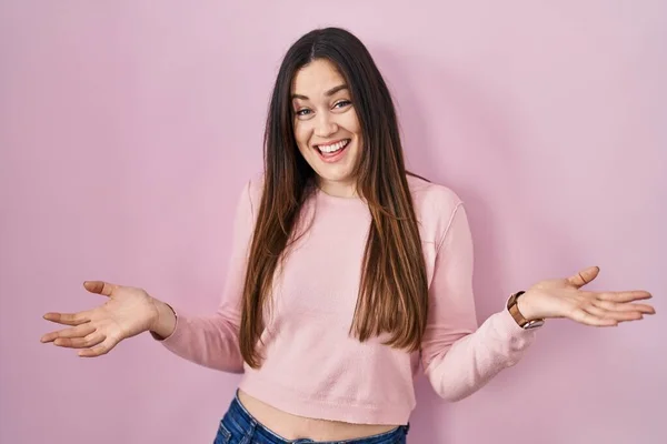 Young Brunette Woman Standing Pink Background Smiling Cheerful Open Arms — 스톡 사진