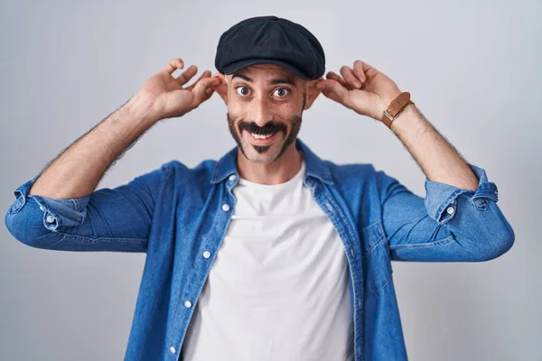 Hispanic Man Beard Standing Isolated Background Smiling Pulling Ears Fingers — 스톡 사진