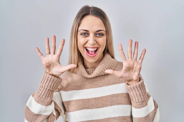 Young Blonde Woman Wearing Turtleneck Sweater Isolated Background Showing Pointing — Stock Photo, Image