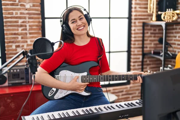 Young Woman Artist Playing Electrical Guitar Music Studio — Stok fotoğraf