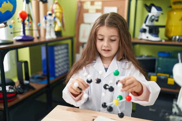 Adorable Hispanic Girl Student Holding Molecules Laboratory Classroom — Stock Photo, Image