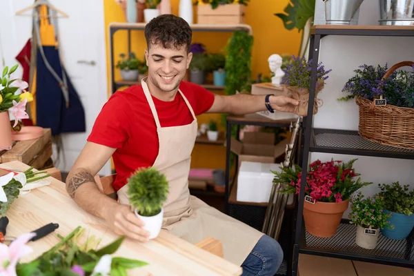 Young Hispanic Man Florist Smiling Confident Holding Plants Flower Shop — Stock Photo, Image