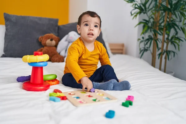 Adorable Hispanic Boy Playing Maths Puzzle Game Sitting Bed Bedroom — Stock Photo, Image