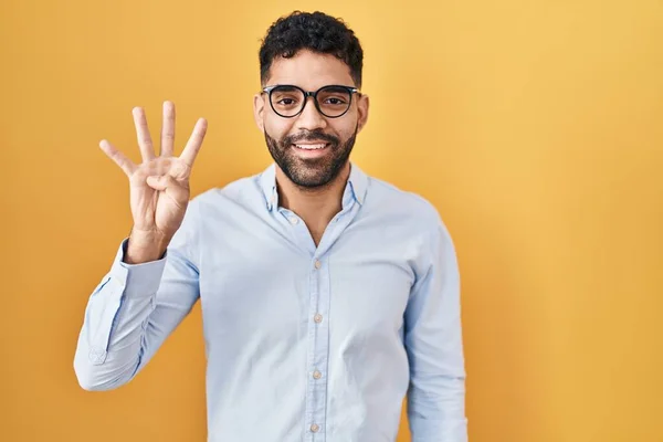 Hispanic Man Beard Standing Yellow Background Showing Pointing Fingers Number — ストック写真