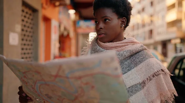Young African American Woman Serious Expression Holding City Map Street — стоковое фото