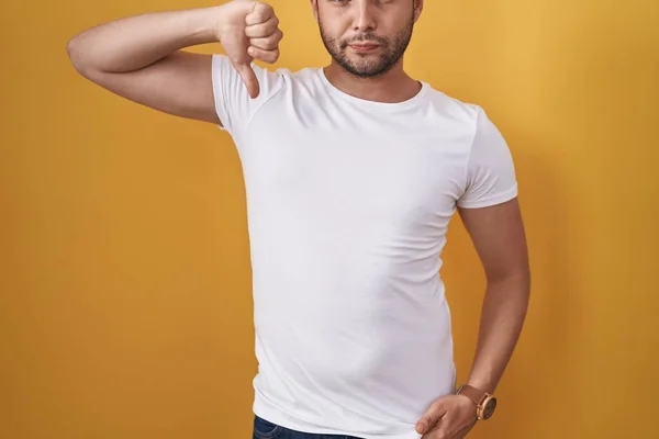 Hispanic Man Wearing White Shirt Yellow Background Angry Face Negative — Stock Photo, Image