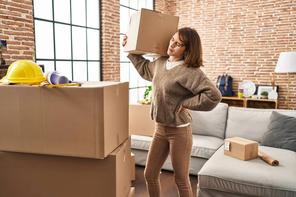 Young Caucasian Woman Backache Holding Package New Home — Foto Stock