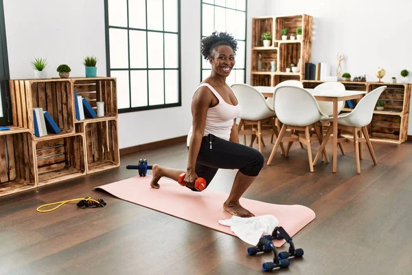 African American Woman Smiling Confident Using Dumbbells Training Home — Stockfoto