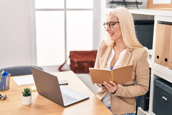 Young Blonde Woman Business Worker Writing Notebook Working Office — Stock Photo, Image