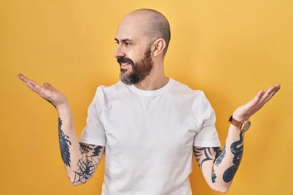Young Hispanic Man Tattoos Standing Yellow Background Smiling Showing Both — Fotografia de Stock