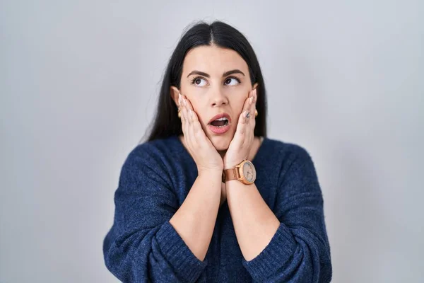 Young Brunette Woman Standing Isolated Background Tired Hands Covering Face — Stockfoto
