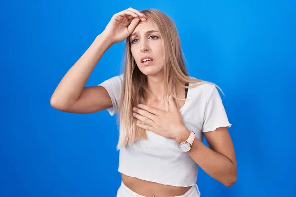 Young Caucasian Woman Standing Blue Background Touching Forehead Illness Fever — Fotografia de Stock
