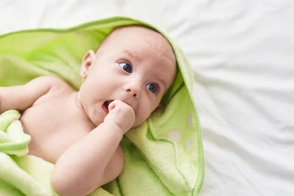 Adorable Caucasian Baby Lying Bed Bitting Hand Bedroom — Stock Photo, Image