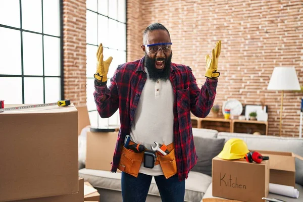 African American Man Working Home Renovation Celebrating Mad Crazy Success — Stock Photo, Image