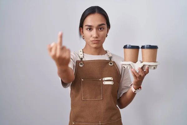 Young Hispanic Woman Wearing Professional Waitress Apron Holding Coffee Showing —  Fotos de Stock