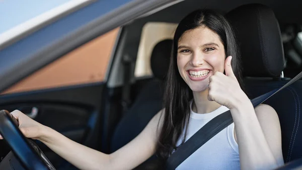 Young Beautiful Hispanic Woman Sitting Car Doing Thumb Gesture Street — Stock Photo, Image