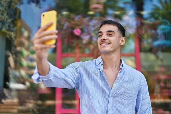 Young Hispanic Man Smiling Confident Making Selfie Smartphone Street — Stok fotoğraf