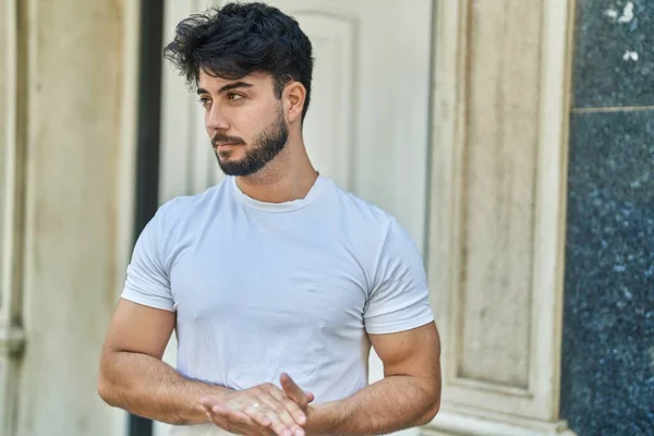 Young Hispanic Man Relaxed Expression Standing Street — Stockfoto