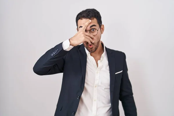 Handsome Business Hispanic Man Standing White Background Peeking Shock Covering — Stock Photo, Image