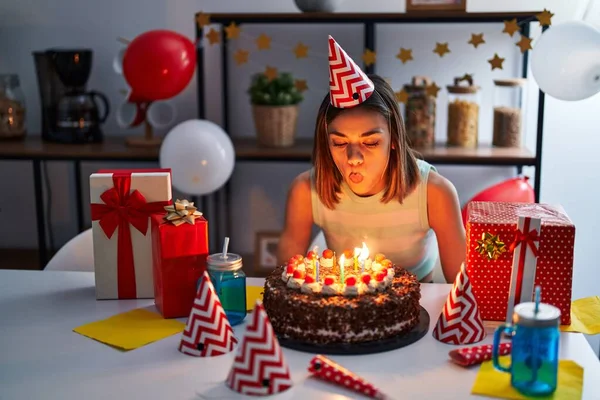 Young Beautiful Hispanic Woman Celebrating Birthday Blowing Candle Home — 图库照片