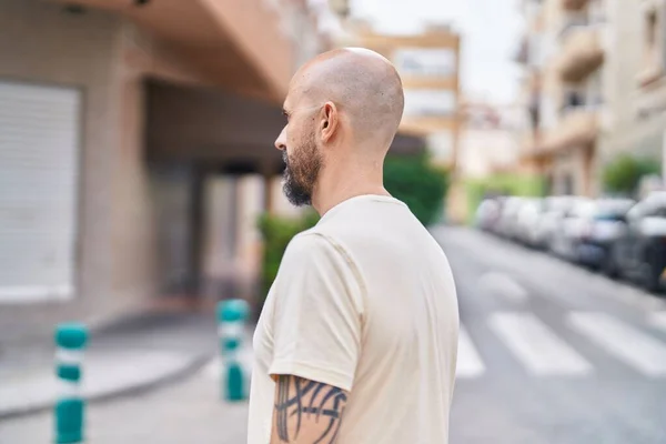 Young Bald Man Looking Side Serious Expression Street — Stock Photo, Image