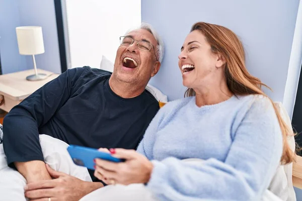 Middle Age Man Woman Couple Using Smartphone Lying Bed Bedroom — Stock Photo, Image