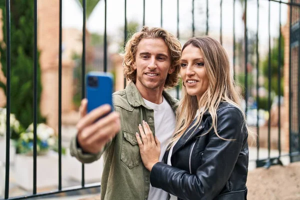 Man Woman Couple Smiling Confident Make Selfie Smartphone Street — Stockfoto