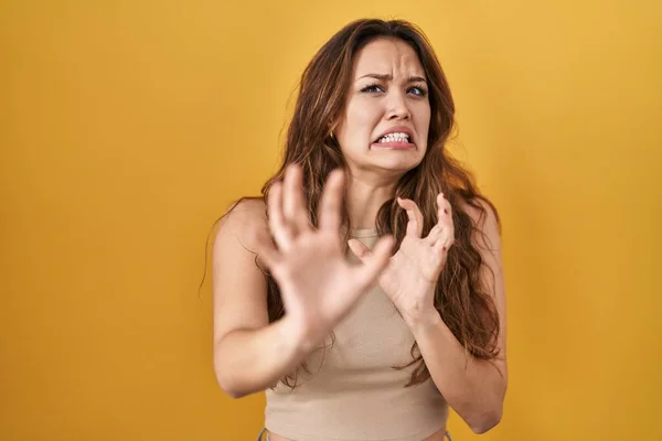 Young Hispanic Woman Standing Yellow Background Afraid Terrified Fear Expression — Stok fotoğraf