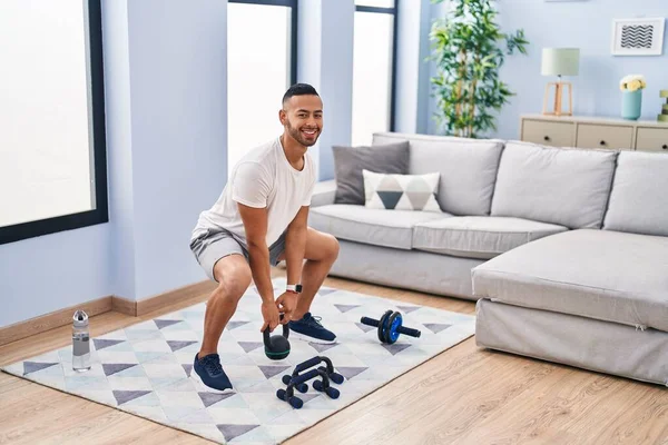 African American Man Smiling Confident Using Kettlebell Training Home — Stok fotoğraf
