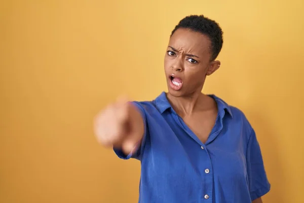 African American Woman Standing Yellow Background Pointing Displeased Frustrated Camera — Stock Photo, Image