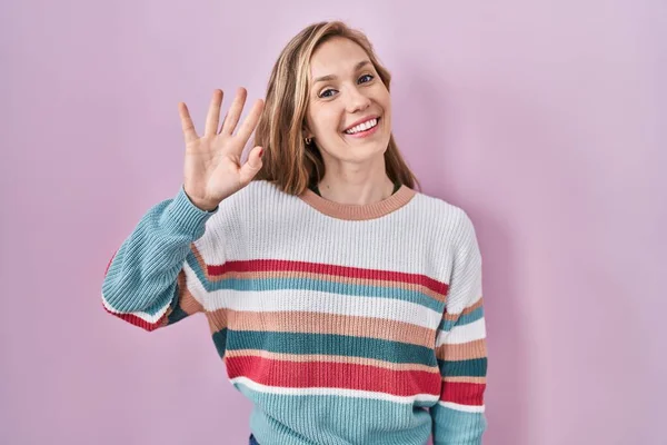 Young Blonde Woman Standing Pink Background Waiving Saying Hello Happy — Foto de Stock